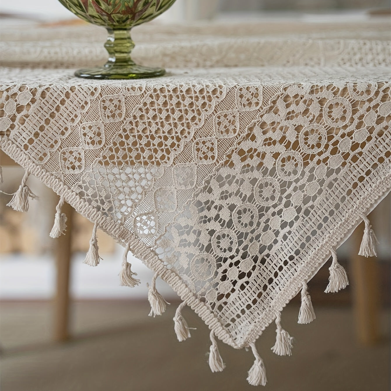 Bohemian chic crochet lace tablecloth, ideal for dining and parties. Rectangular polyester design with a farmhouse style, perfect for boho home decor. Great for buffet tables, banquets, and serving western food.