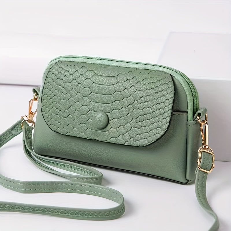 Stylish mini crossbody bag for women with removable strap and zipper closure. Suitable for commuting and shopping.