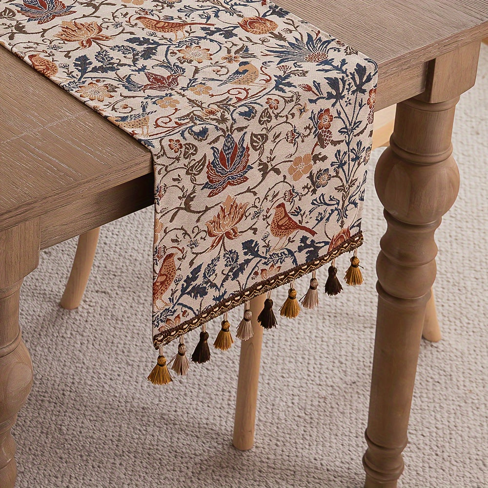 Vintage floral and bird jacquard table runner with tassels in rustic countryside style. Made of polyester, 33cm wide. Ideal for dining, coffee, and tea tables. Vintage design with polyester fabric.