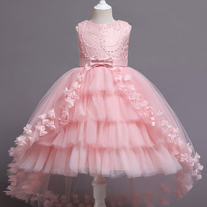 Elegant sleeveless princess dress with flowing tail, lace, and floral embellishments. Perfect for pageants, weddings, piano performances, and birthday parties. Made with tweedlike texture