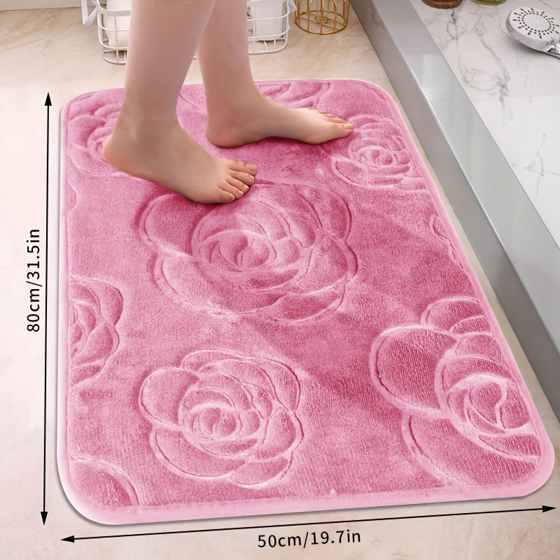 Soft and luxurious bath mat featuring a beautiful rose embossed design. This non-slip bathroom rug is made of ultra-soft knit polyester, providing superior comfort and absorbency. Lightweight and washable, this versatile mat is perfect for use in the