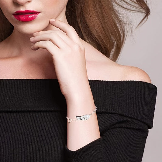 This angel wing bracelet is crafted with S925 silver and adorned with hypoallergenic synthetic zirconia, making it both simple and stylish. It is a luxurious and fashionable piece of jewelry that is perfect for Valentine's Day gifts, parties, and