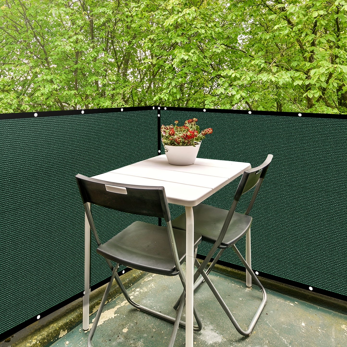 Heavy duty green plastic privacy fence with brass grommets and straps, perfect for balconies, yards, and pools. Provides 90% visibility blockage and acts as a pet protective barrier.