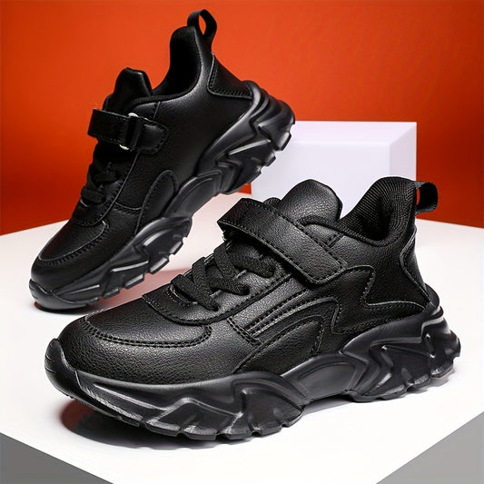 Black boys' footwear with water-resistant, hook-and-loop strap, and soft EVA sole - versatile for running.