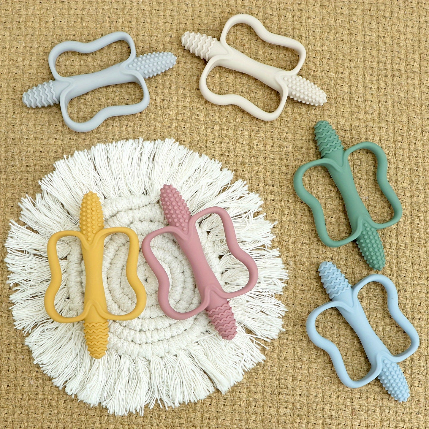 Soft silicone butterfly-shaped baby teether designed for easy gripping and soothing teething relief. Suitable for ages 0-3 years, available in multiple colors, and easy to clean. Perfect as an ideal baby gift.