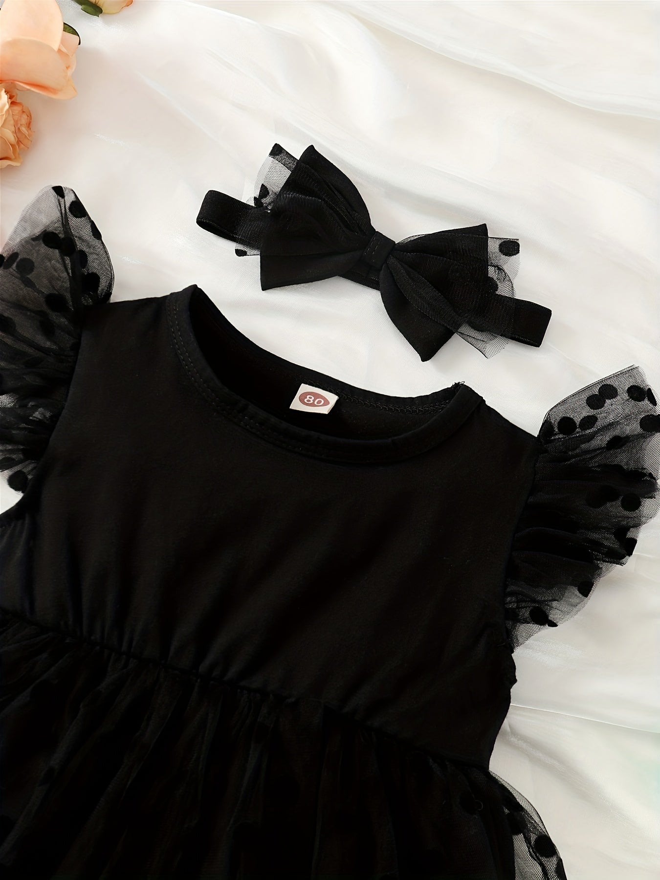 Chiffon flutter sleeve bodysuit for baby girls, ideal for parties, holidays, and outdoor wear.