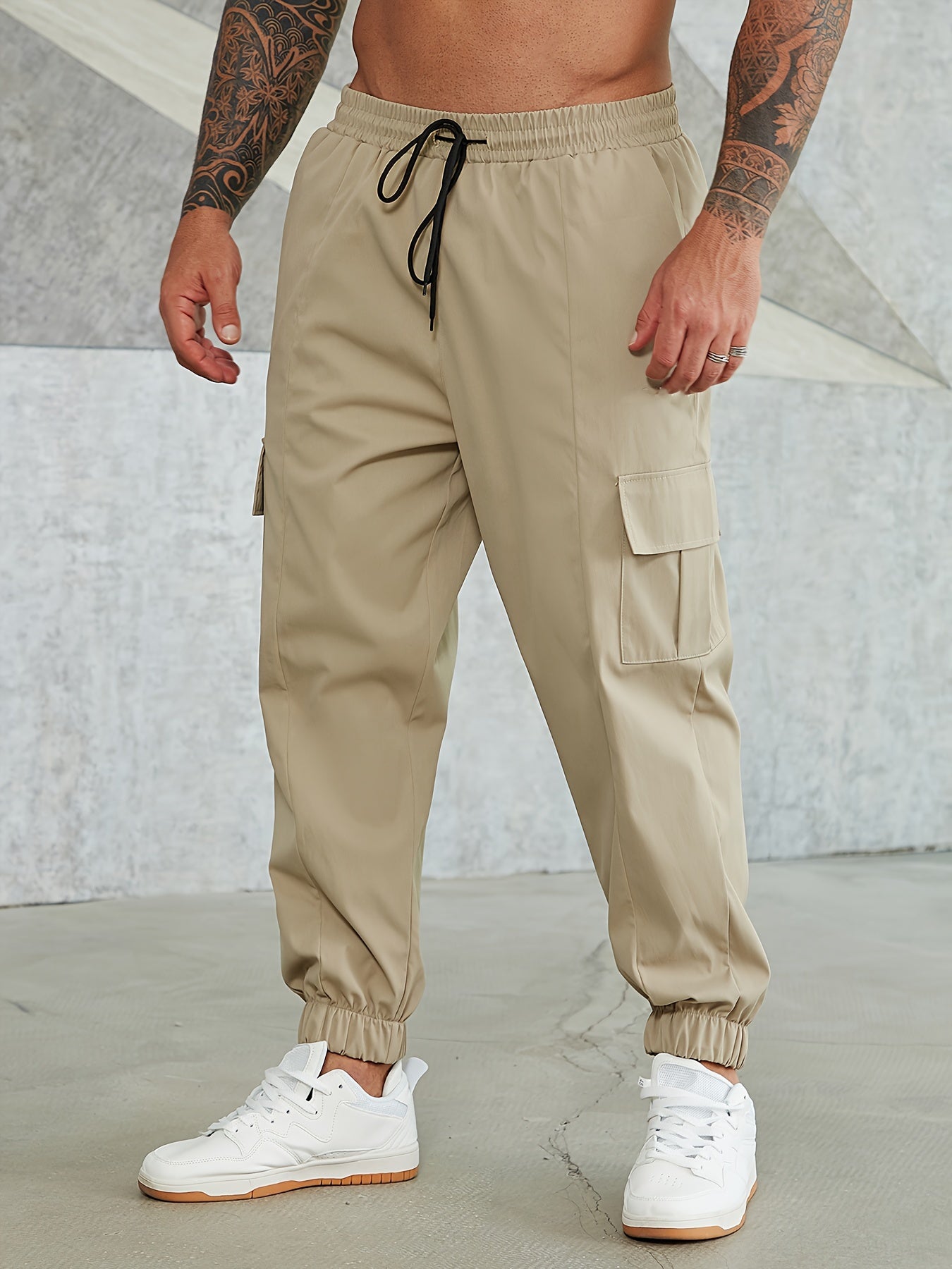 Solid cargo pants for plus size men, ideal for sports and outdoor activities.