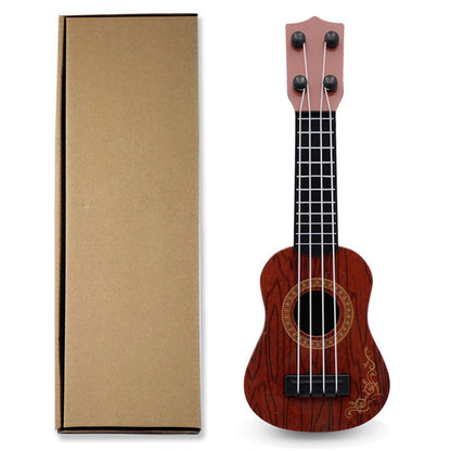 Mini playable uke instrument figurine made of plastic for home and office decor, ideal gift for music enthusiasts.