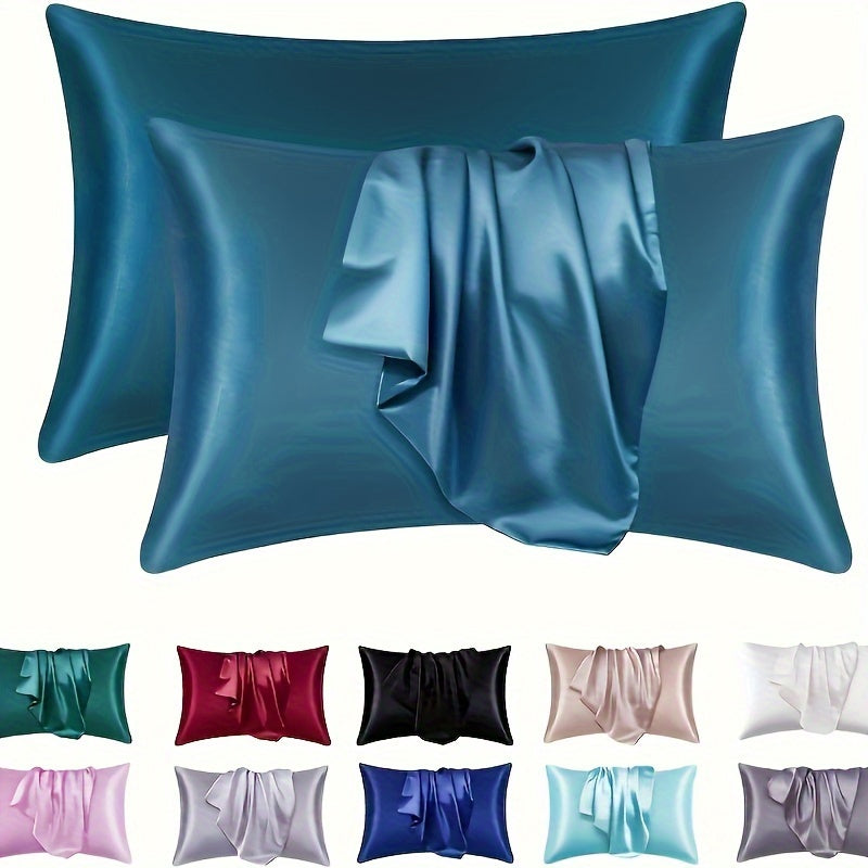 Two luxurious silky soft pillowcases with breathable and skin-friendly cooling feel. Solid color with envelope closure. Machine washable. Set of two.