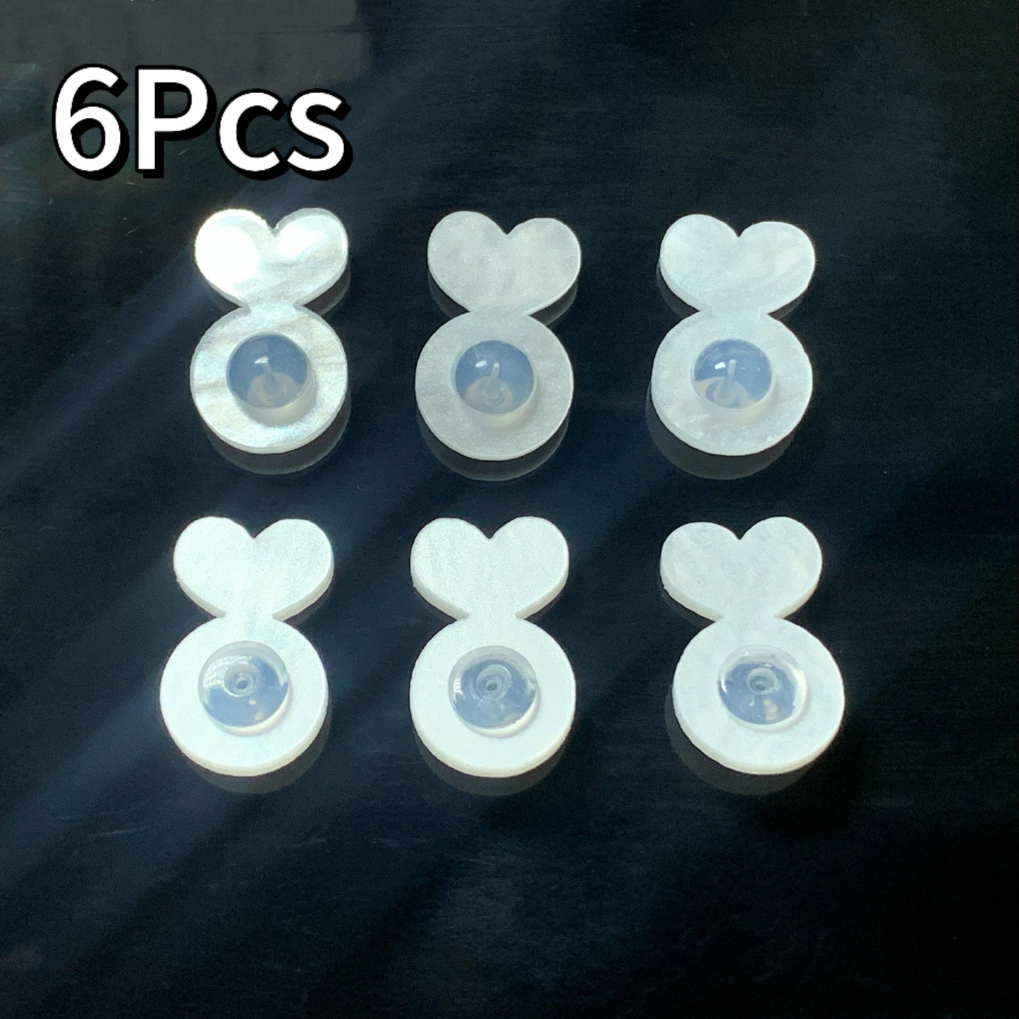 Silicone ear post backs provide invisible support for heavy earrings, preventing earlobes from drooping. This safe solution is ideal for studs and pendants.