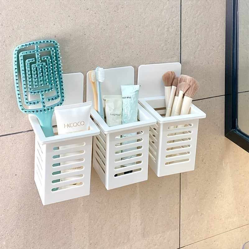 1-piece plastic wall-mounted bathroom organizer with 1 shelf for storage of toothbrush, toothpaste, comb, and makeup brushes. Weather-resistant with no golden pipes or shelves included.