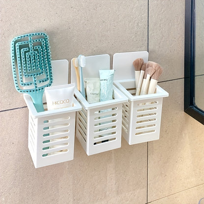 1-piece plastic wall-mounted bathroom organizer with 1 shelf for storage of toothbrush, toothpaste, comb, and makeup brushes. Weather-resistant with no golden pipes or shelves included.