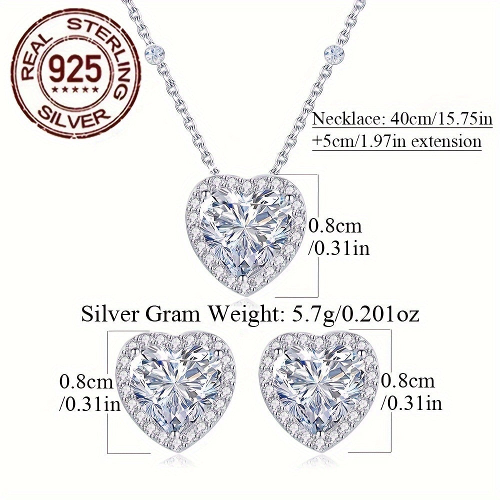 An Elegant Jewelry Set for Women, adorned with a Romantic Heart Design crafted from 925 Sterling Silver, weighing 5.7g/0.201oz. This stunning set features low allergenic properties and is embellished with sparkling White Cubic Zirconia in a Three-Prong