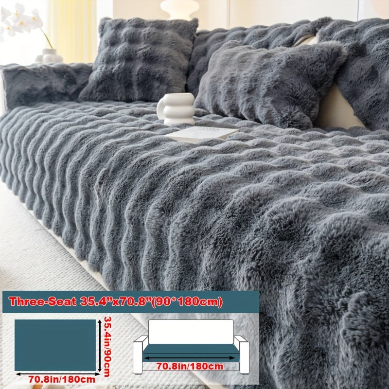 Faux rabbit fur sofa cover for cozy winter warmth. Pet-friendly, machine washable. Fits single to four-seater sofas. Perfect for living room, bedroom, office decor.