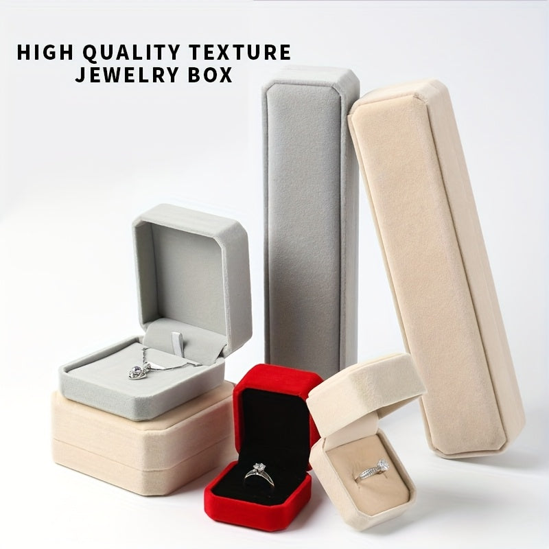 Elegant velvet jewelry box with cufflink compartment, classic design for rings, earrings, and necklaces. Soft fabric interior, available in multiple colors. Ideal gift packaging for special occasions.