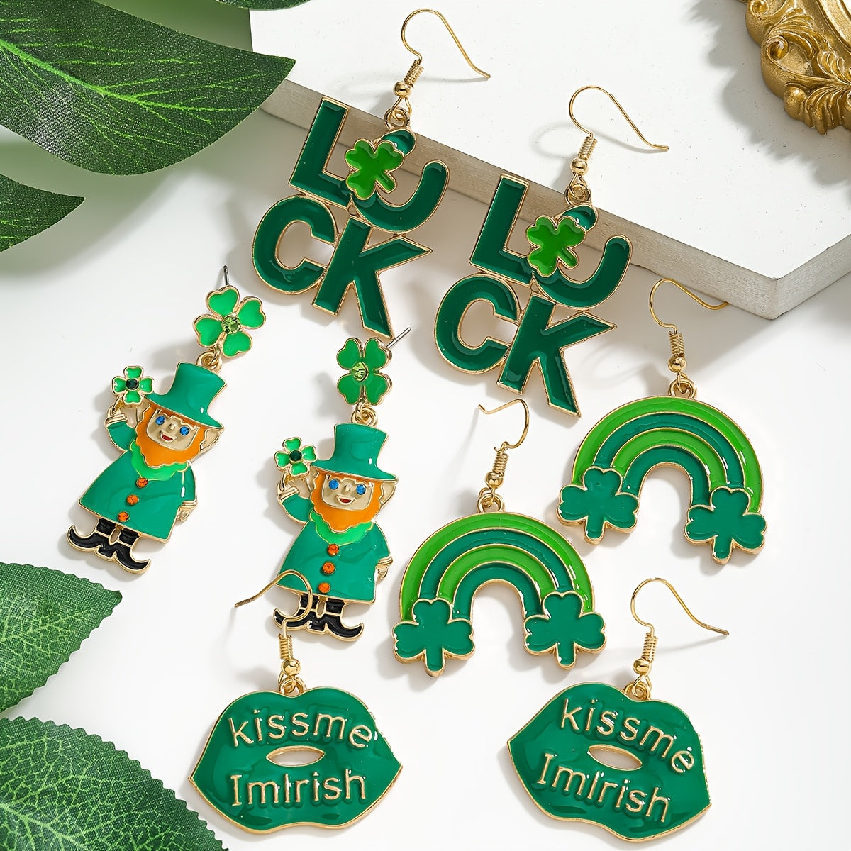 St. Patrick's Day Charm Earrings featuring a Lucky Clover and Rainbow Design adorned with Sparkling Rhinestones. Made with Stainless Steel Posts, these Earrings are crafted from Alloy, making them a Perfect Gift for Her. In Irish Green, Lip-shaped, Oil