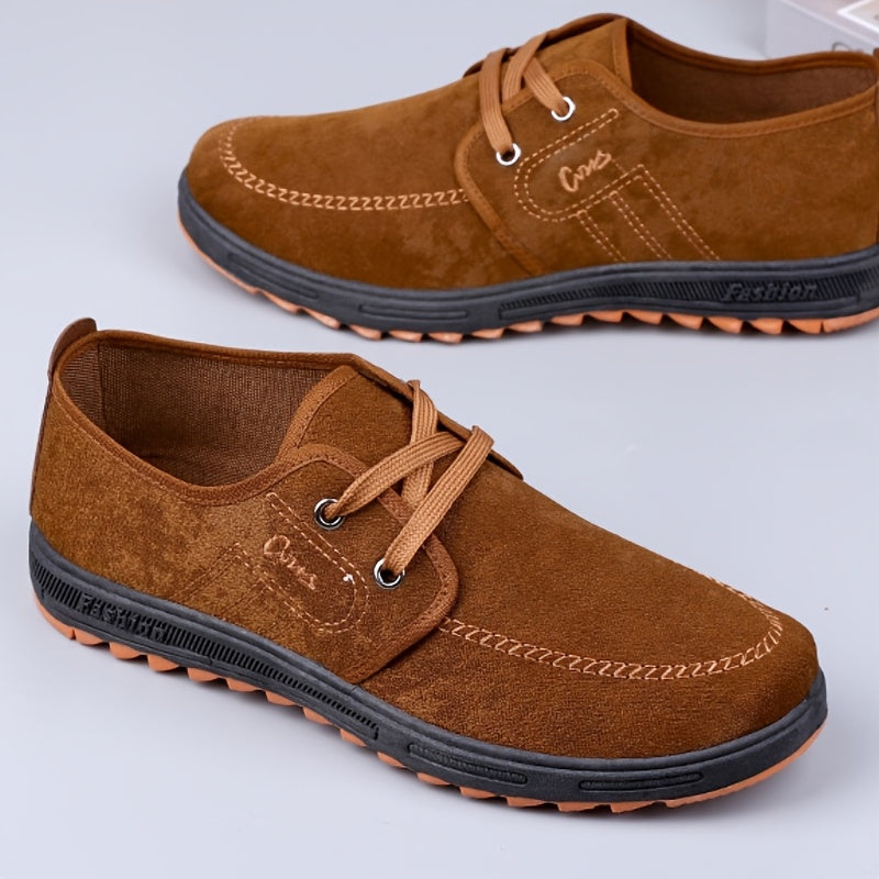 Comfortable men's slip-on canvas shoes in solid colors, ideal for outdoor activities.