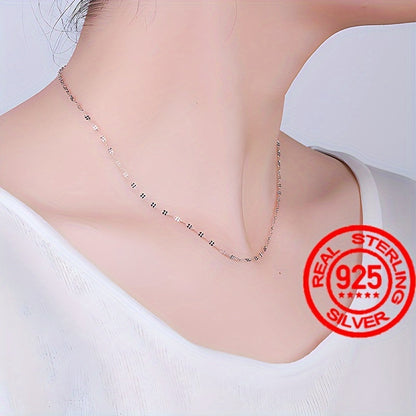 S925 silver necklace featuring Japanese and Korean style, adorned with a simple and elegant lip pendant. This light luxury clavicle chain exudes a high-level sense of style. Delicate and plain chain design in beautiful silvery color, weighing 1.6g.