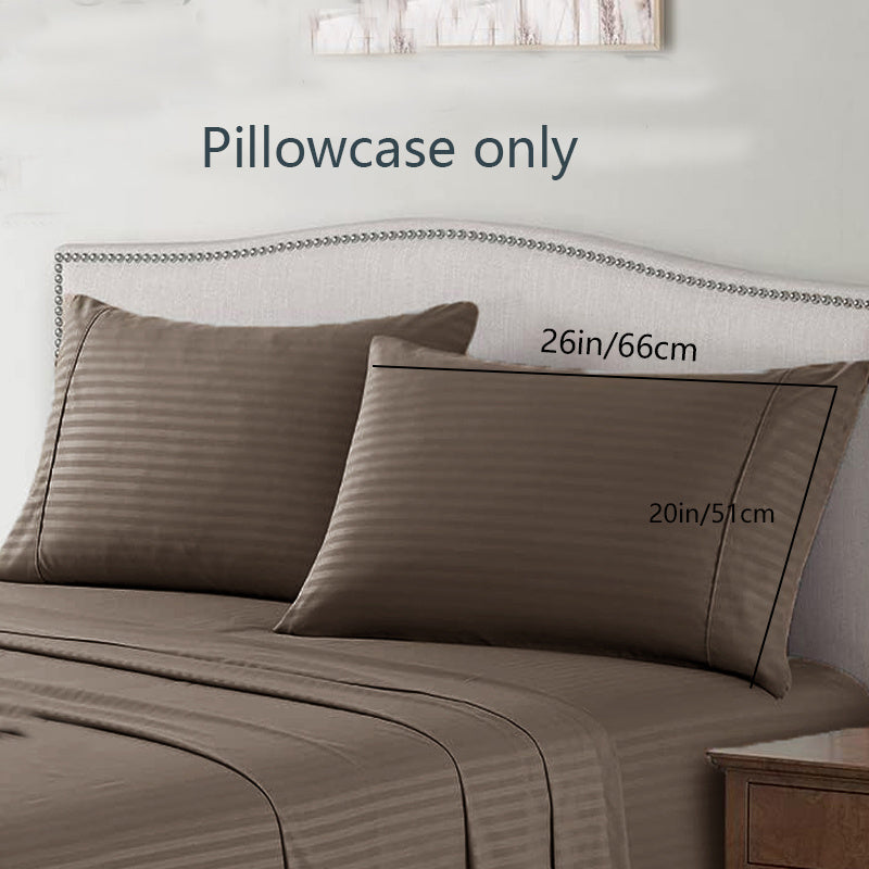 A pair of striped pillowcases made from soft, breathable woven polyester. These pillowcases are machine washable and have a sanded finish for added comfort. They do not include a pillow insert and are made from non-printed lightweight fabric with a 90gsm