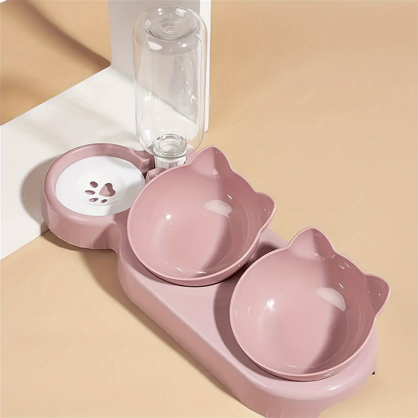 Tilted double pet bowl set with automatic water feeder and gravity water bottle for neck protection.