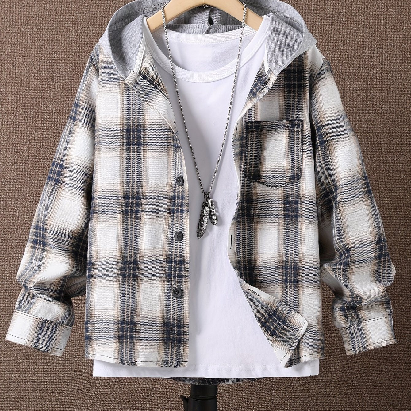 Plaid hooded shirt for boys in cozy knit fabric with pockets, regular fit and slight stretch, perfect for fall/winter season.