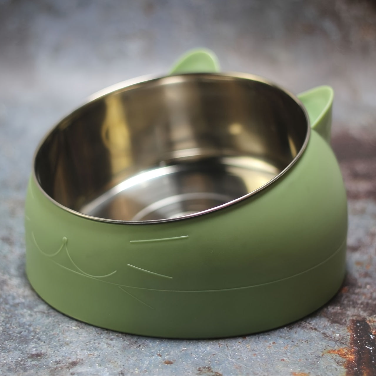 Raised stainless steel cat feeder bowl with non-slip base for neck protection, holds 100ml of food or water.