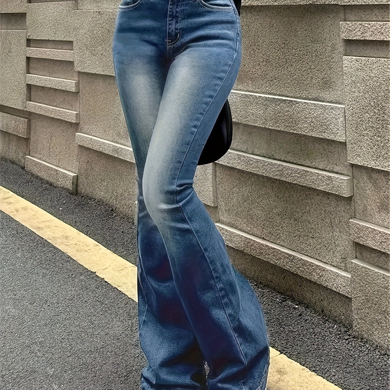 Mid-rise stretch flare jeans for women with retro washed finish, perfect for fall and winter.