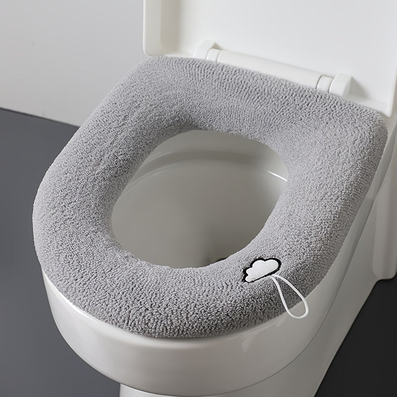 Soft, warm plush toilet seat cover for all seasons. Perfect bathroom accessory or holiday gift.