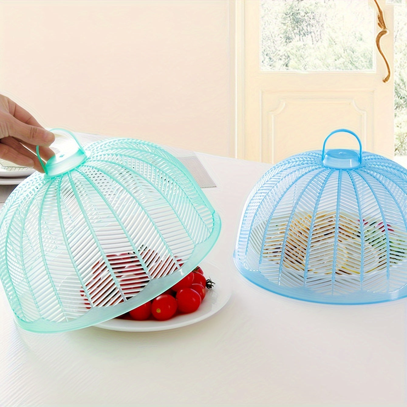 Set of 3 plastic food covers with colorful mesh screens for outdoor use. Keep flies, bugs, and dust away from your plates and bowls during picnics, parties, and in the kitchen.