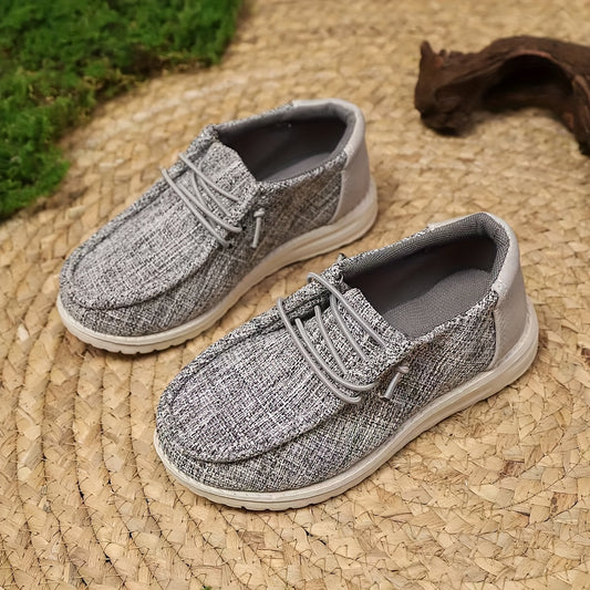 Stylish, lightweight Korean canvas slip-on shoes with a soft sole for children.