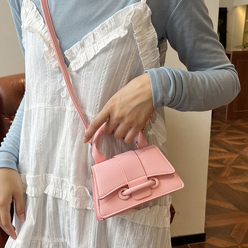 Women's chic mini crossbody bag, small square design in a solid color with magnet closure and adjustable shoulder strap, perfect for daily use and commuting.