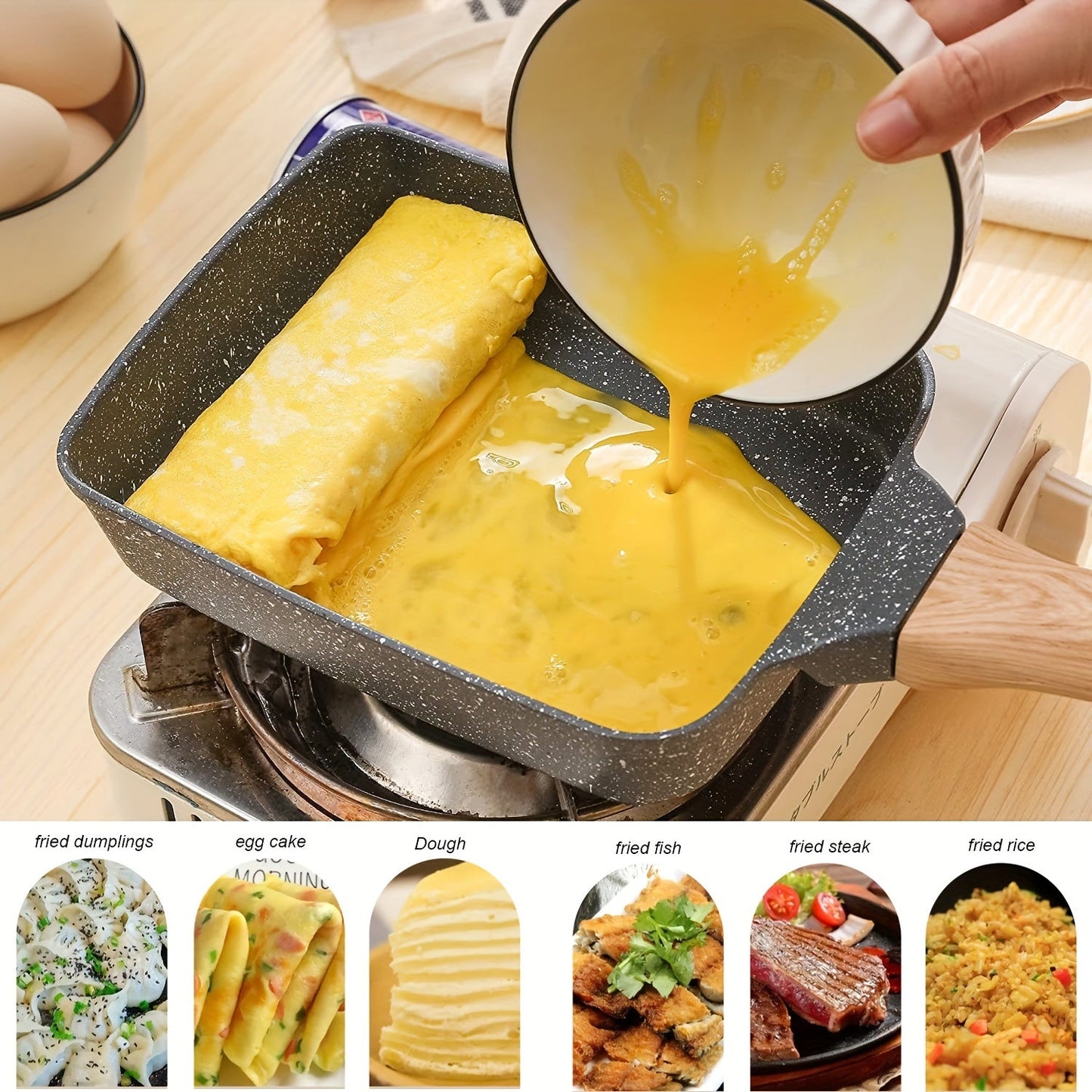 Tamagoyaki Pan: Black square pan for making Japanese omelettes, measuring 14.99 x 18.49cm. Features a non-stick surface, wood handle, and rectangle shape for easy egg rolls and frying. Perfect addition to your kitchenware collection.