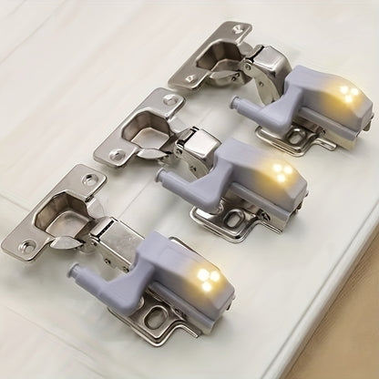 12-pack of STAR ORANGE Cabinet Hinge LED Lights with motion sensor for various rooms, warm and white light, gray plastic design, battery-operated (batteries not included).