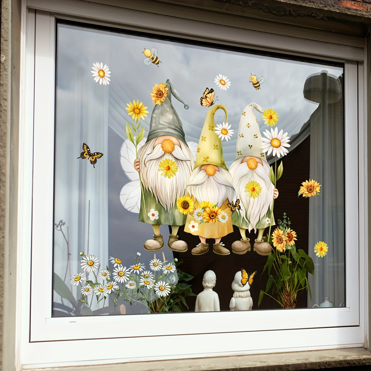 Add a touch of whimsy with this charming Bee & Gnome Elder Sunflower Daisy Electrostatic Window Cling. Made of durable, double-sided, reusable PVC sticker that is 5mil thick for vibrant home decor. Featuring a playful Gnome design and Sunflower Daisy