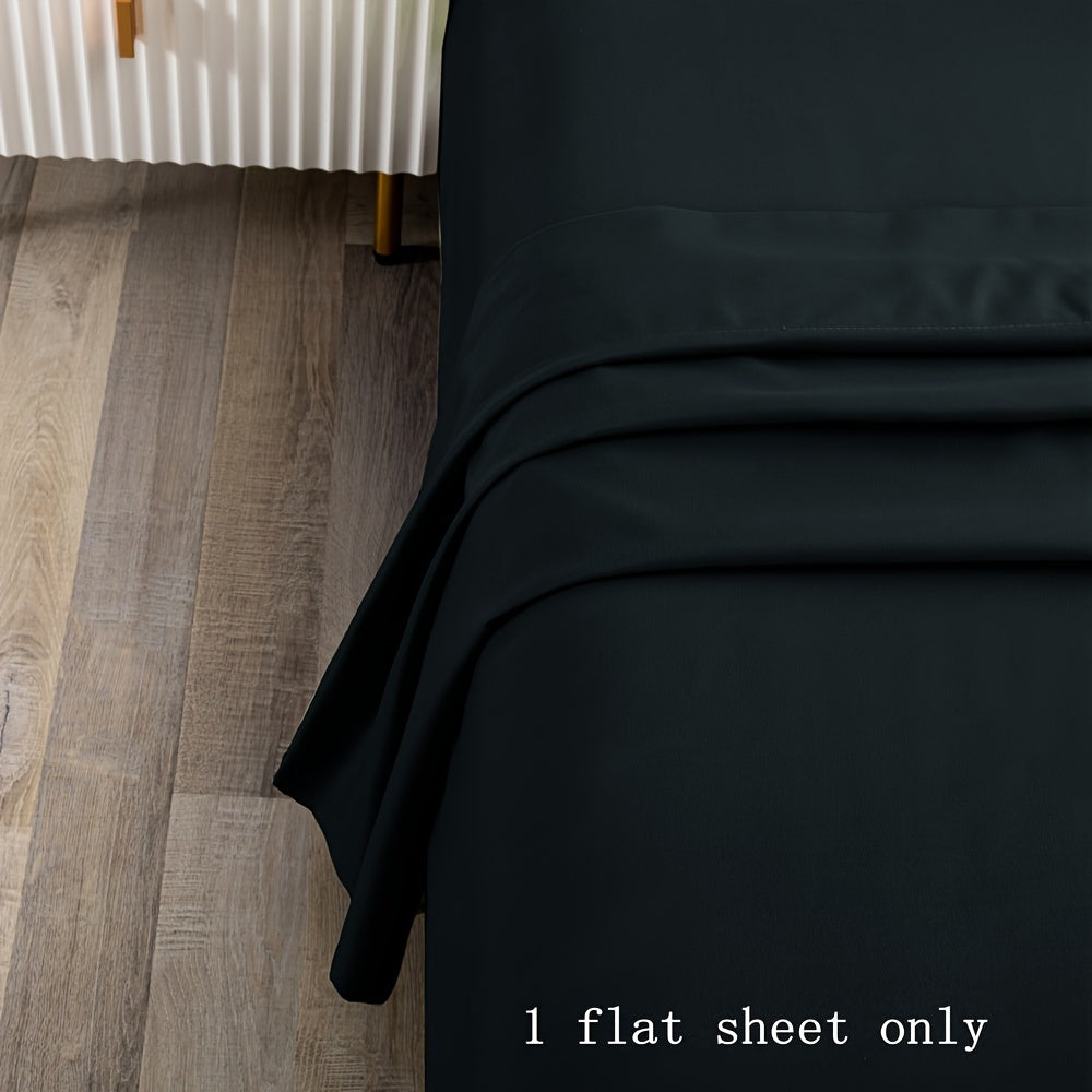 Soft and luxurious 100% microfiber flat sheet in a solid color with a brushed finish - Easy to care for with machine washable material, perfect for any bedroom or guest room.