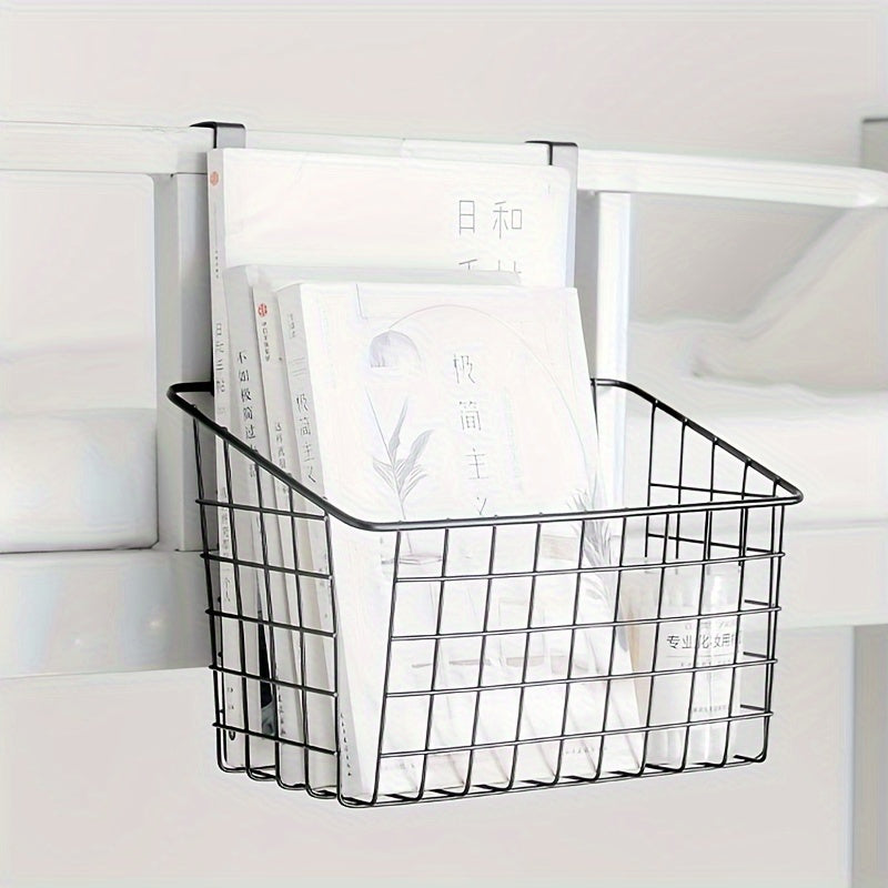 Over-the-door storage basket made of durable metal, easy to install and suitable for bathrooms, kitchens, and balconies. Comes in black or white.