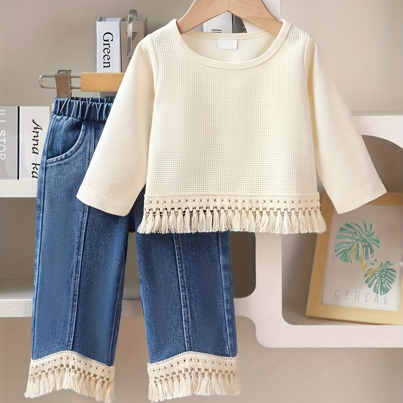 Polyester tassel top and jeans set, ideal for outdoor wear in the autumn and winter.