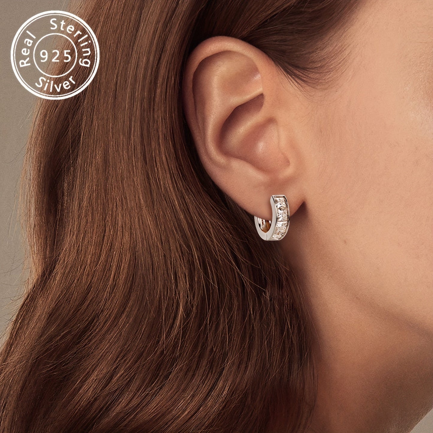 A set of elegant earrings featuring thick Moissanite stones set in 925 silver. These princess square cut earrings showcase an irregular design, creating a unique and eye-catching look. The pure silver earrings are lightweight at 5.5g and feature 8 pieces