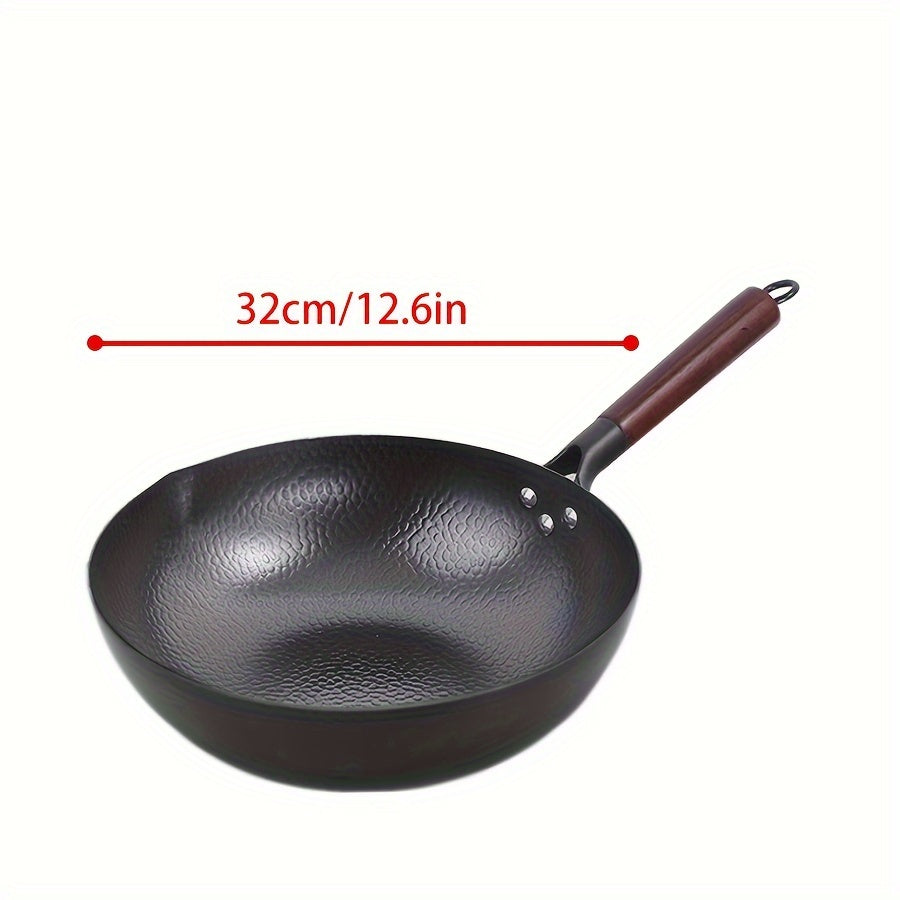 Traditional hand-forged 32cm/12.6in iron wok and stir-fry pan comes with a wooden lid. This non-coated, non-stick pan should be hand washed only. It features a durable cast iron handle and is compatible with smooth surface non-induction cooktops.