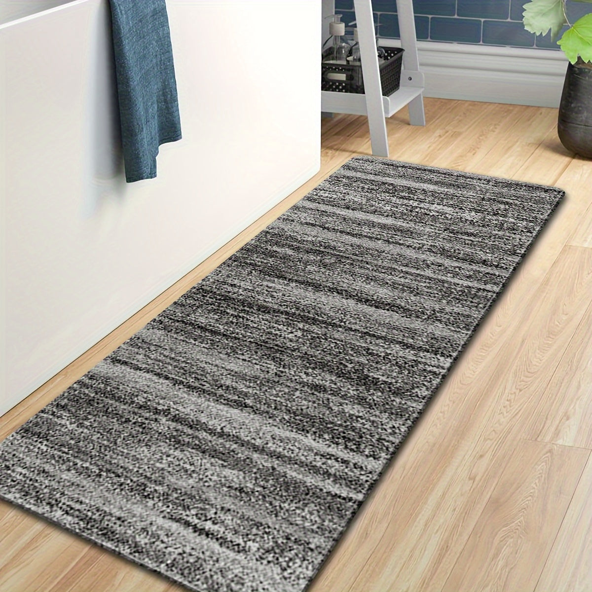 One piece of Contemporary Transitional Gray Runner Rug, featuring a non-skid washable design for use in laundry rooms, kitchens, hallways, or as an accent piece. The distressed floor carpet comes in various sizes: 40*60cm, 50*80cm, 50*120cm, 50*160cm