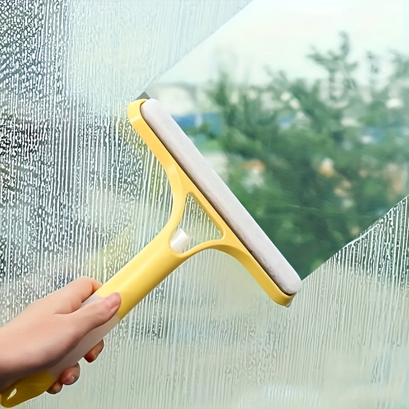 Multi-functional cleaning tool that includes a double-sided glass scraper and built-in spray bottle. Made of durable plastic material, perfect for use on windows, mirrors, floors, and cars. An essential tool for keeping your living room spotless.