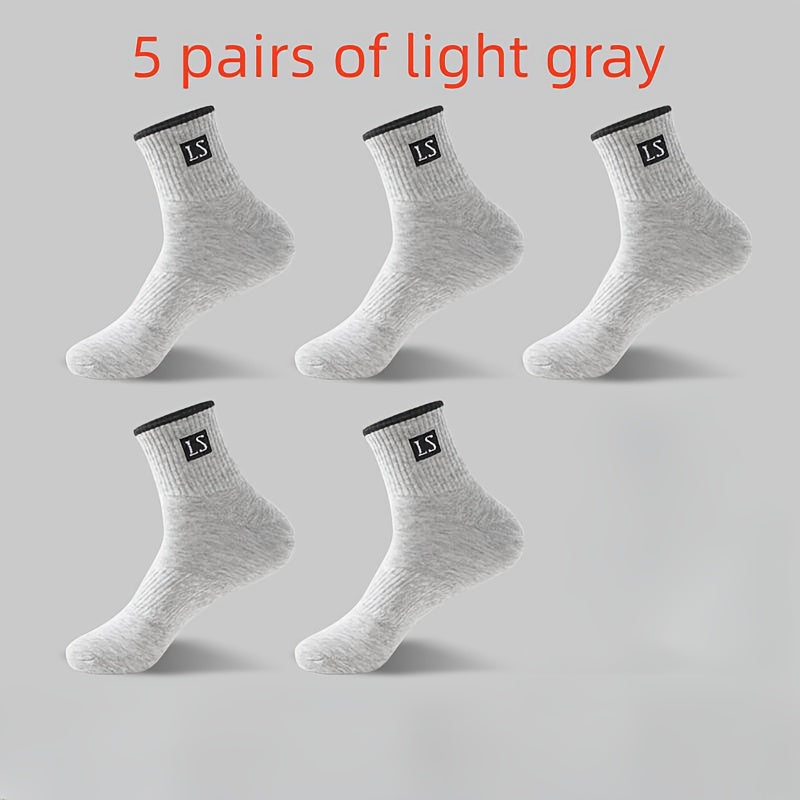 5 pairs of men's crew socks with alphabet pattern, made of knit polyester and spandex blend, breathable and soft, suitable for sports and casual wear, machine washable.