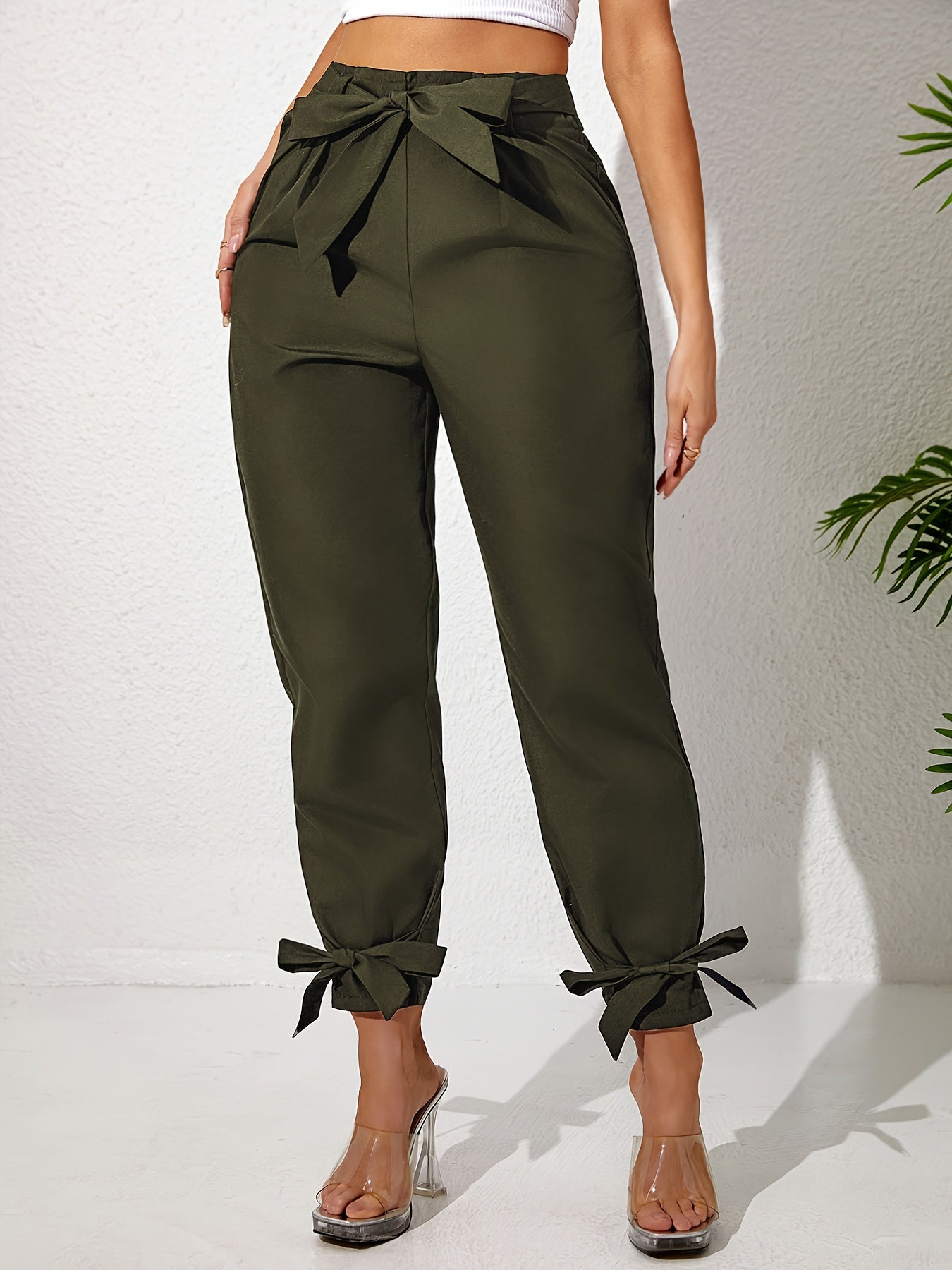 Solid straight leg pants with elastic drawstring waist and elegant bow detail. Perfect for spring and summer in plus size.