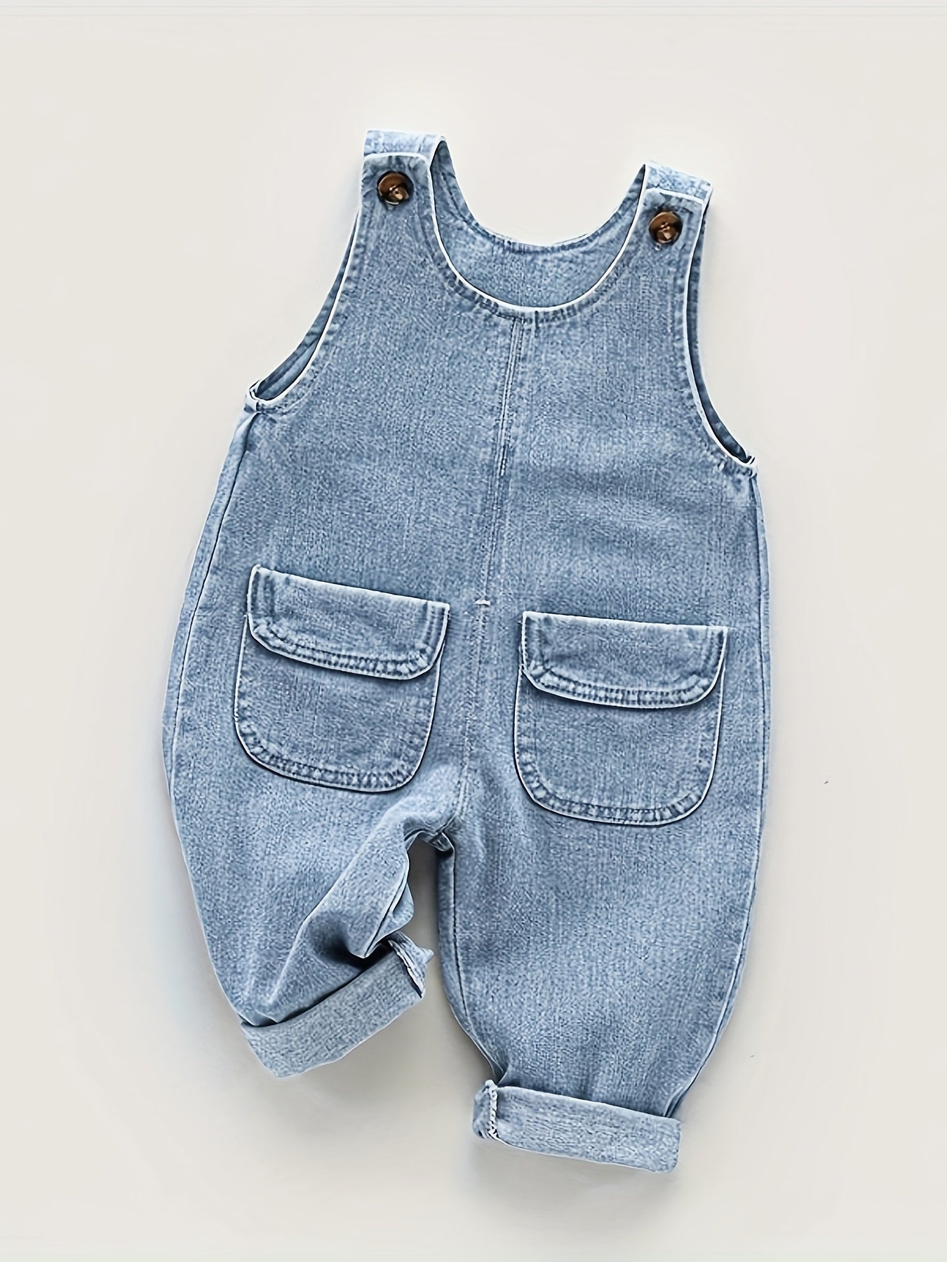 Light blue denim overalls for toddler boys with adjustable straps, pockets, and non-stretch fabric. Ideal for spring/fall and outdoor activities.