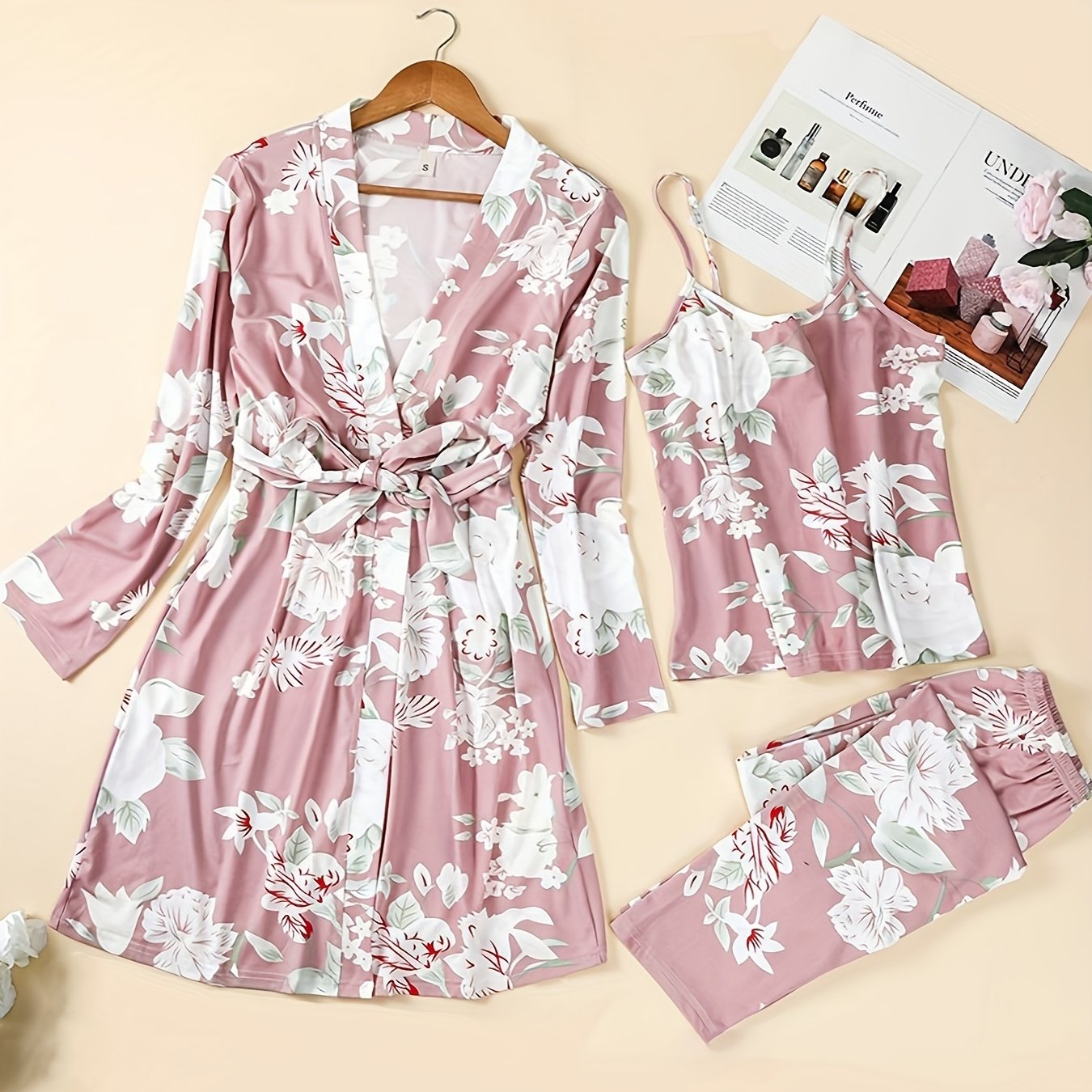 Floral print lounge set with cami top, belted robe, and pants for women.