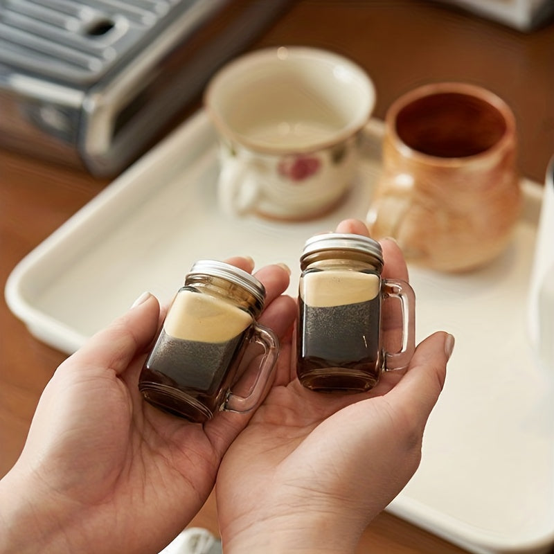 Mini Mason jar shot glass with lid, leakproof glass, ideal for home, parties, and bars. Perfect for beverages such as coffee, milk, juice, honey, and jam. Hand wash only.