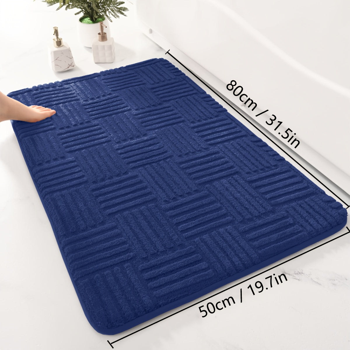 One piece of a thickened bathroom absorbent mat with a non-slip bathtub rug. Can also be used as a home entryway carpet with a solid color and stripe pattern. The mat is rectangular in shape and lightweight, machine-made with a PVC backing. Made of