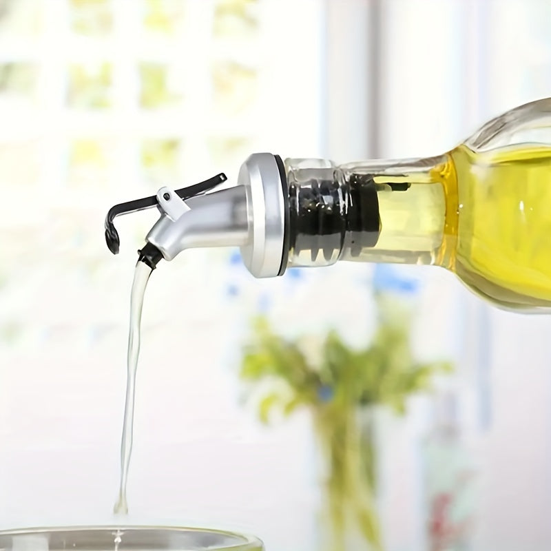 Leakproof olive oil dispenser for salad dressing and cooking, with easy-pour vinegar bottle stopper.