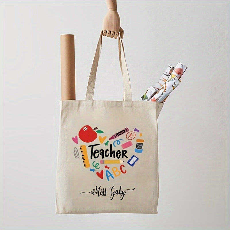 Customized shoulder bag with personalized name, featuring a lovely "Teacher Love Inspire" print on durable canvas material. The perfect back to school gift for teachers.