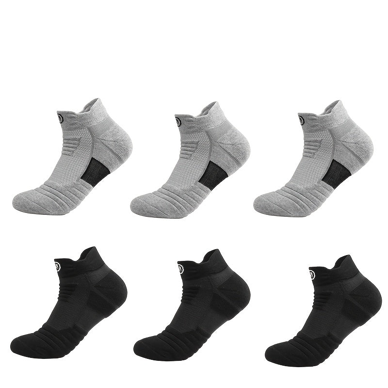 5 pairs of high-performance athletic compression socks for men in gray, black, and white. Made with breathable polyester and sweat-wicking material with a towel bottom, featuring a